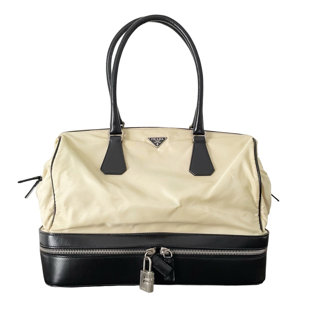 Prada RARE light tan nylon black leather doctor travel bag lock triangle logo